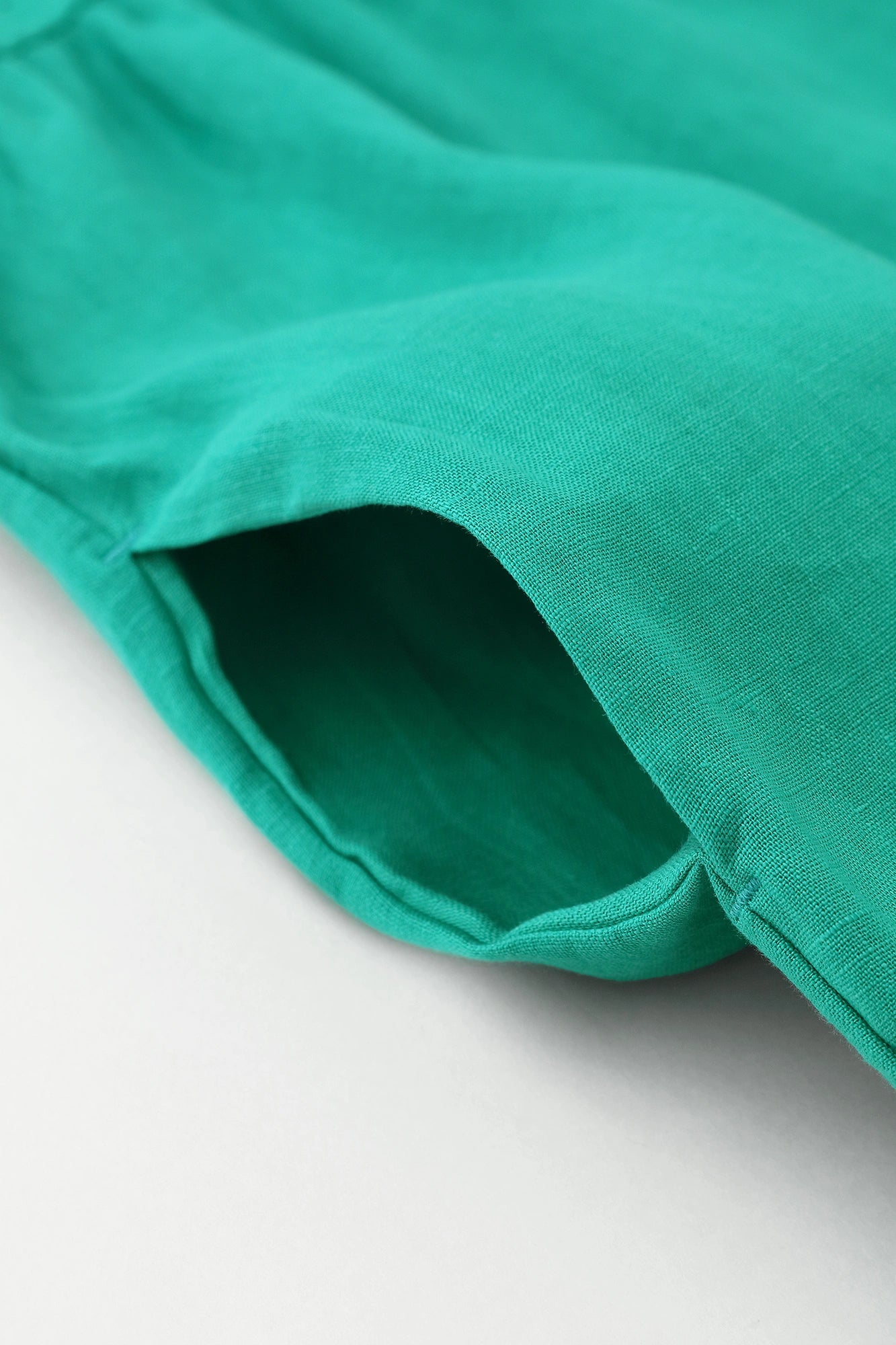 Faltenkleid aus Leinen/Smaragdgrün